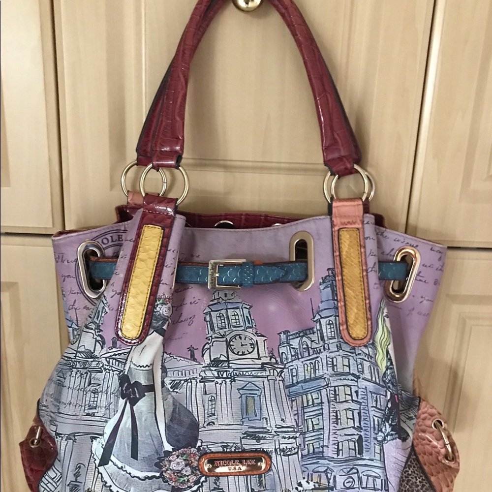 Handbag with zippered compartments inside and out.